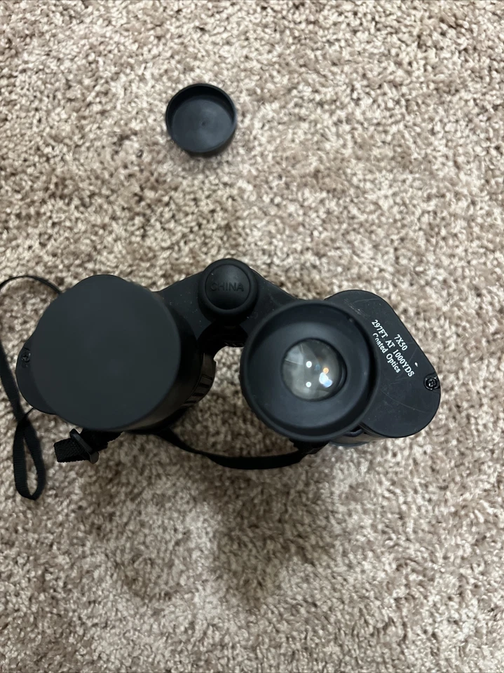 Binoculares ópticos recubiertos Emerson 7x50 con estuche de transporte usados excelente estado Foto 2 de 3