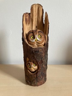 Owl & Owlet heads hand carved in a small log 7" tall