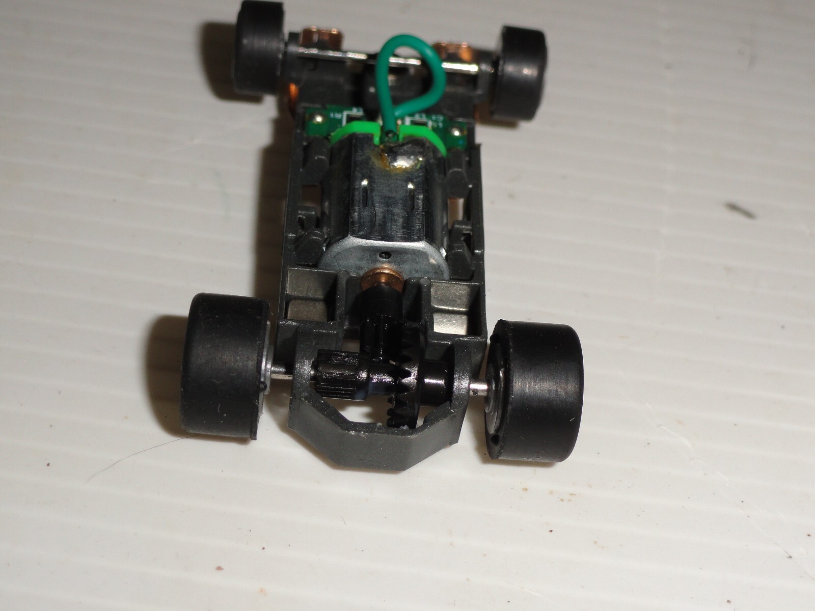 AFX MEGA G+ HO SLOT 1.7 Long NARROW CHASSIS GRAY 5 SPOKE RIMS AND TIRES