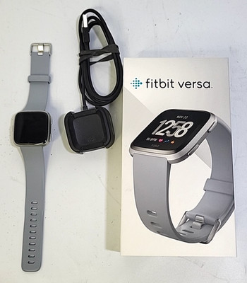 Fitbit Versa 1st Gen Smart Watch w/ Charging Cradle.