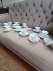 Set of 11 vintage/antique bone china teacups and saucers. — photo 1