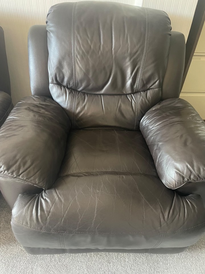 Brown leather two seater manual recliner and two manual reclining