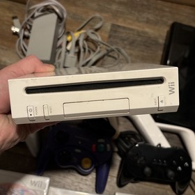 11lb Nintendo Wii & WiiU Console Lot of 2 Black White, 11 Games Cables Remotes