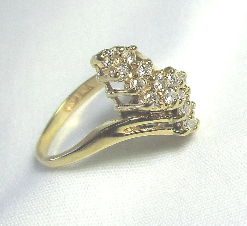 EMA 14K Yellow Gold and Diamond Ring 5.35 grams size 4 16 diamonds