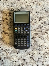 Texas Instruments TI-83 Handheld Graphing Calculator *READ/ No cover