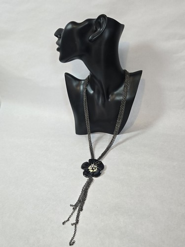 Chunky black flower pendant with multistranded chains necklace