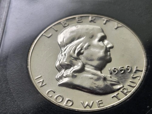 1959 SILVER HALF DOLLAR UNC.