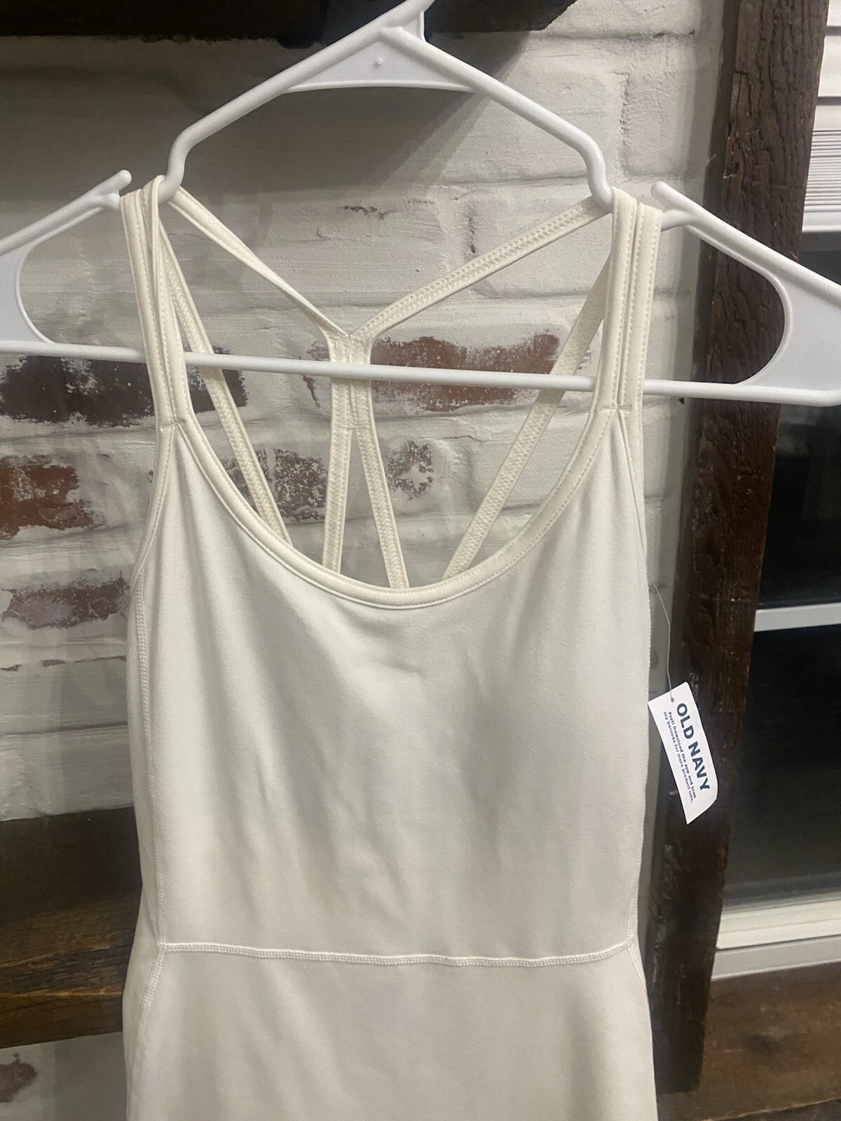 OFF WHITE Reggiseno vestito Oldy Navyvo att topto cortosto nasco tascae colore bianco sporc nuo conchetta eti sm.ghia