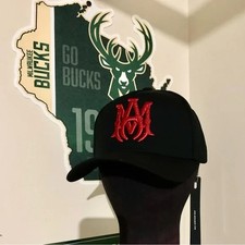 AMIRI Black Hat with Vibrant Red Emblem