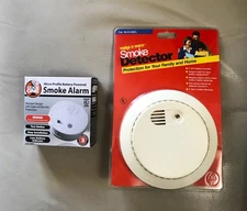 2 - New Sealed - Smoke Detectors - "Wake N' Warm" & "Code 1"