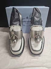 PRADA Brushed Leather Loafers with Metal Details US 7 Bianco