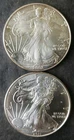 2002 and 2011 $ American Silver Eagle Dollars