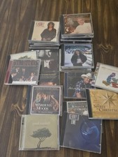 LOT OF 25 ASSORTED EMPTY CD CASES WITH FRONT COVERS AND INSERTS.
