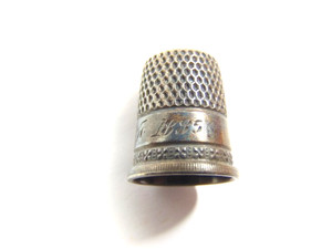 antique sterling silver #7 thimble; shield in dome; monogramed "M to F 1885"