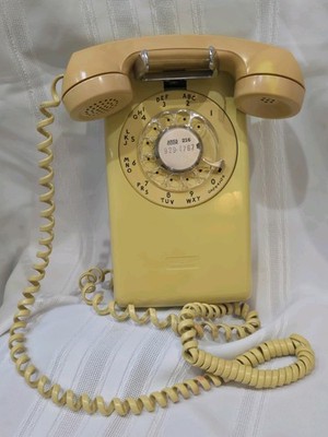 1976 Western Electric 554BMP Yellow Rotary Wall Phone Bell System Dated 7-76