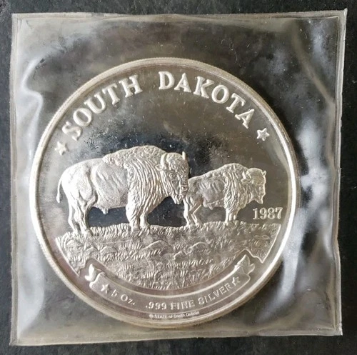 1987 5oz Silver South Dakota Buffalo Round in Plastic