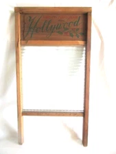Vintage Hollywood glass and wood frame washboard, good graphics