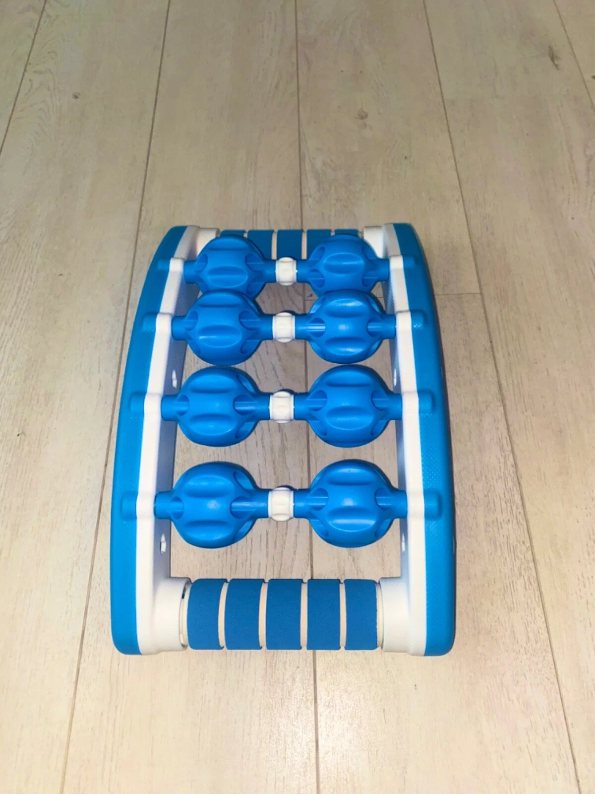 Elite sports massage therapy roller athlete stimulate circulation reduce pain.