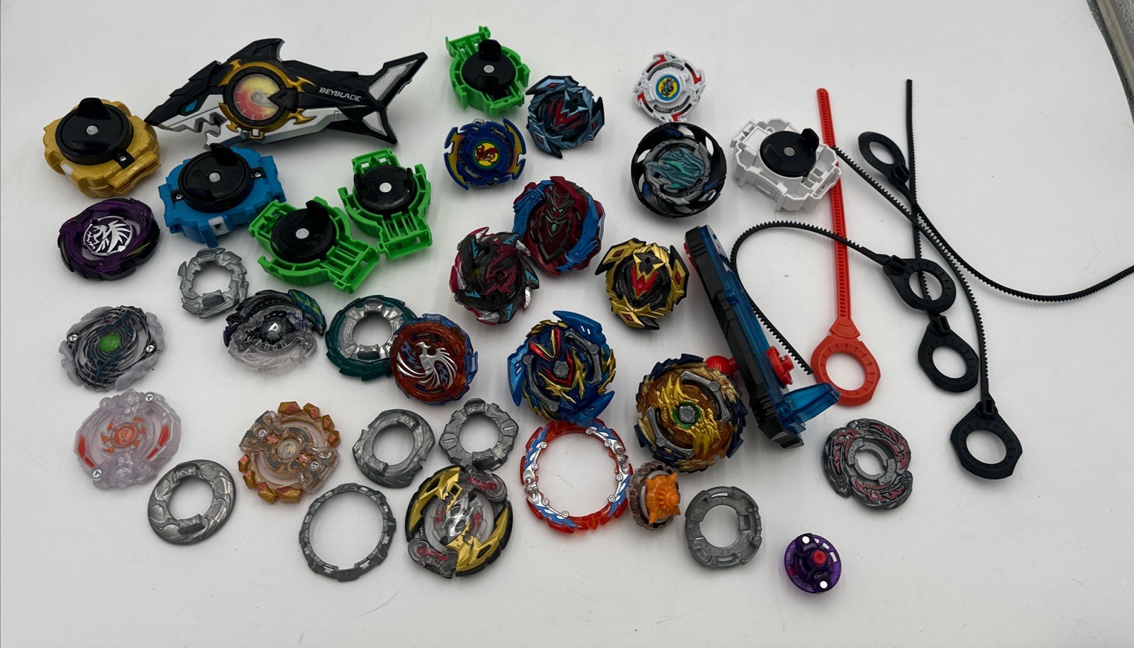 Beyblade Lot of 40 Total Including Launchers Extra Parts Metal And Plastic Tommy