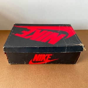 caixa de tenis da nike