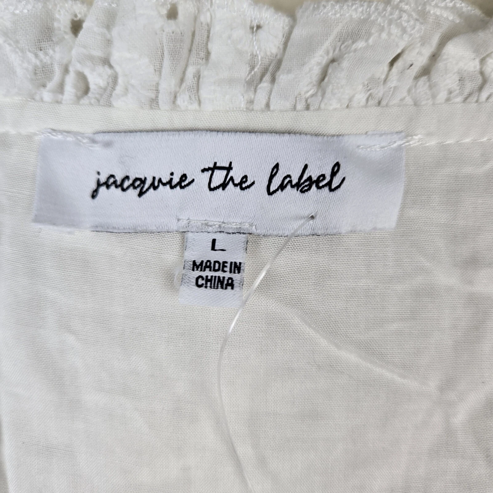 OFF WHITE Abito babydoll Jacquie The Label L bianco sporco occhielli a strati manica corta boho