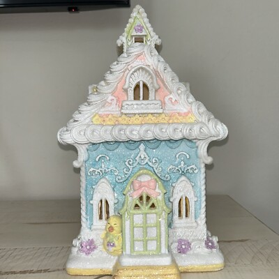 Pastel blue yellow pink Easter Victorian gingerbread house with duck