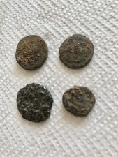 4 unidentified ancient coins, probably Jambi Lion Coins. Ref SY4.