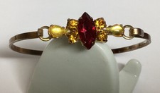 RHINESTONE BANGLE BRACELET GOLDTONE WITH RED  TOPAZ SETS PRETTY VINTAGE