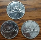 1965 $1 dollar Canada Silver Dollar. 3 total.