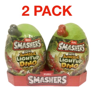 Zuru Smashers Mini Jurassic Light Up Dino Spielset mit über 6 Überraschungen - 2er Pack