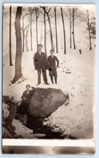 RPPC Unidentified Real Photo People - Young Men in Stream Snow Winter Postcard