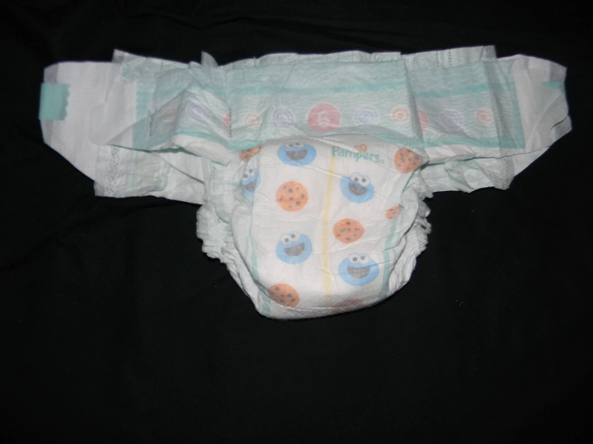 2 modified pampers baby-dry size(6) 35+Lbs with (double tabs)