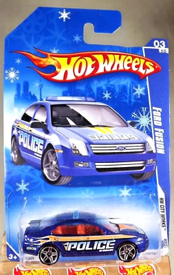 2009 Hot Wheels Target Snowflake #109 HW City Works-Police 3/10 FORD FUSION Blue - Image 1 of 4
