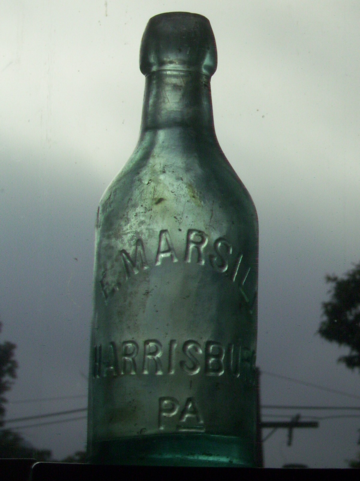 Vintage blue embossed  E. Marsili Harrisburg, Pa. affixed blob top glass bottle