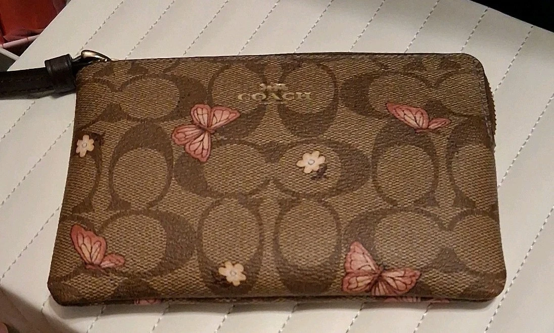 Coach Zippy Pouch da polso con stampa farfalla CC firmata