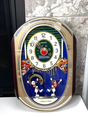 Seiko QXM259GRH Football Melodies in Motion Musical Moving Wall Clock Read
