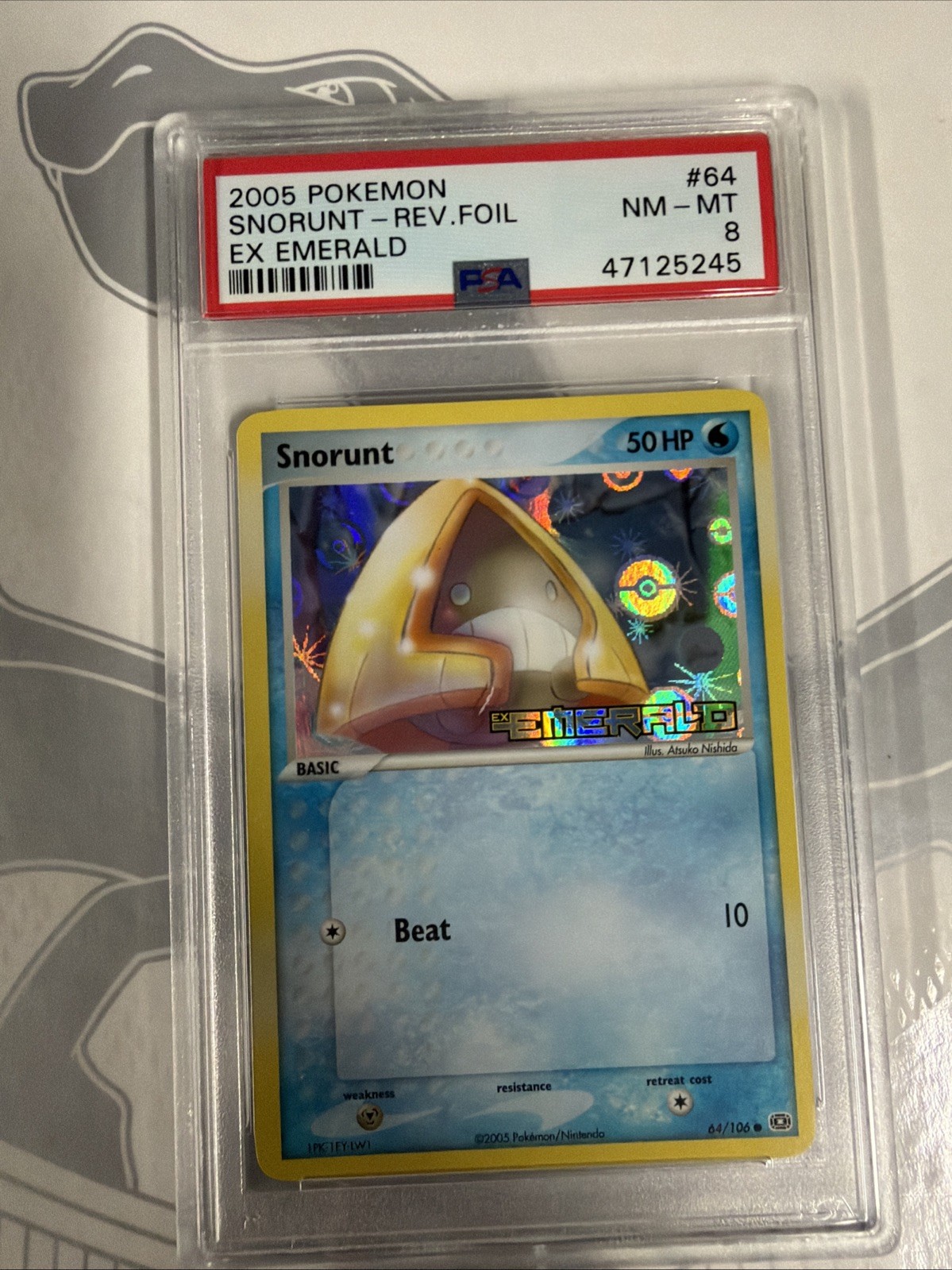 Pokémon TCG Snorunt 64/106 Reverse Holo Stamped EX Emerald - NM PSA 8