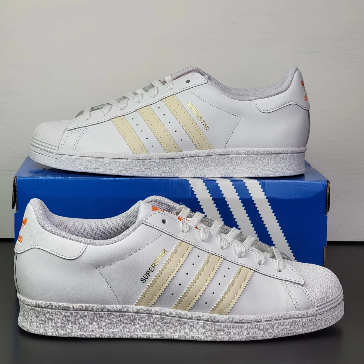 All white low store top adidas