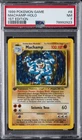 1999 POKEMON BASE SET 1ST EDITION #8 MACHAMP-HOLO PSA 7