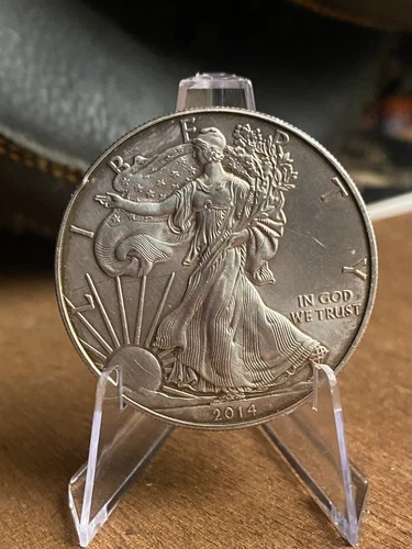 2014 Silver Eagle 1oz 999 Fine Silver With Slight Toning