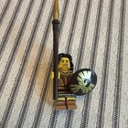 LEGO Minifigure w/ Spear & Round Shield, Brown Armor Outfit, Black Hair — photo 1