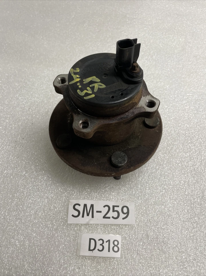 Conjunto de cojinete de rueda y buje trasero derecho del pasajero Mazda 3 2012 OEM Foto 2 de 4