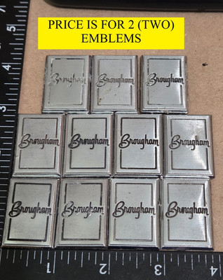 (2) OLDSMOBILE BROUGHAM CIRCA '80S SAIL PANEL EMBLEMS 1'' (5604}