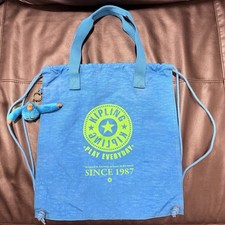 Zaino Kipling blu gioco tutti i giorni con coulisse tote bag con ciondolo scimmia