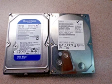 Lot of 2 - 2 TB SATA 3.5 in Drives Western Digital & Hitachi #40840