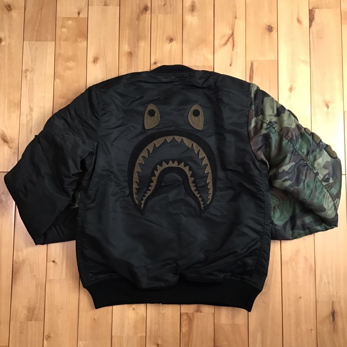 BAPE × undefeated shark MA-1 bomber jacket Black A Bathing BAPE × undefeated shark MA-1 bomber jacket Black A Bathing