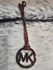 MICHAEL KORS Brown Leather String SIlver Tone MK Logo Bag Charms