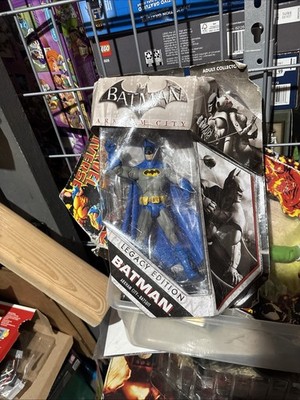 Batman Arkham City Figure Legacy Edition 1970s Batsuit dented package