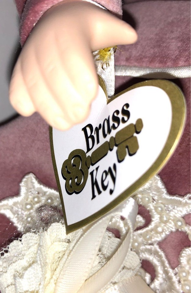 Camellia Garden Collection Genuine Porcelain Brass Key Doll Wooden