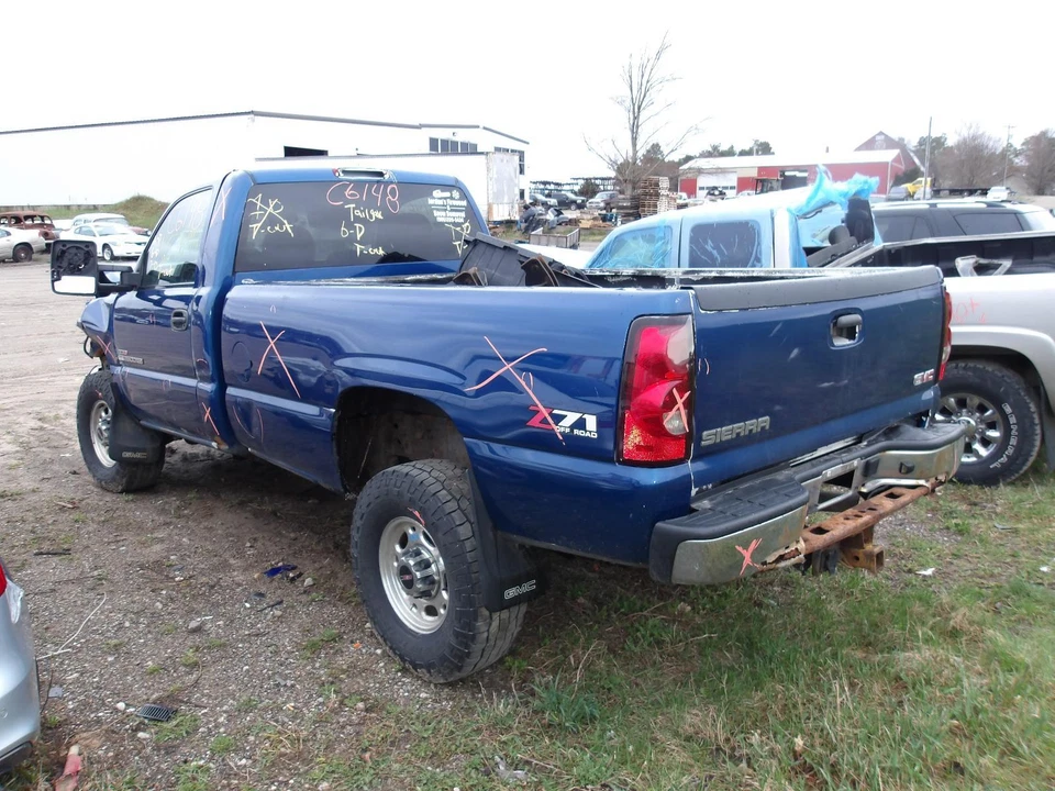 Asiento delantero central usado se adapta a: camioneta GMC Sierra 2500 2004 canastilla y banco Foto 4 de 4